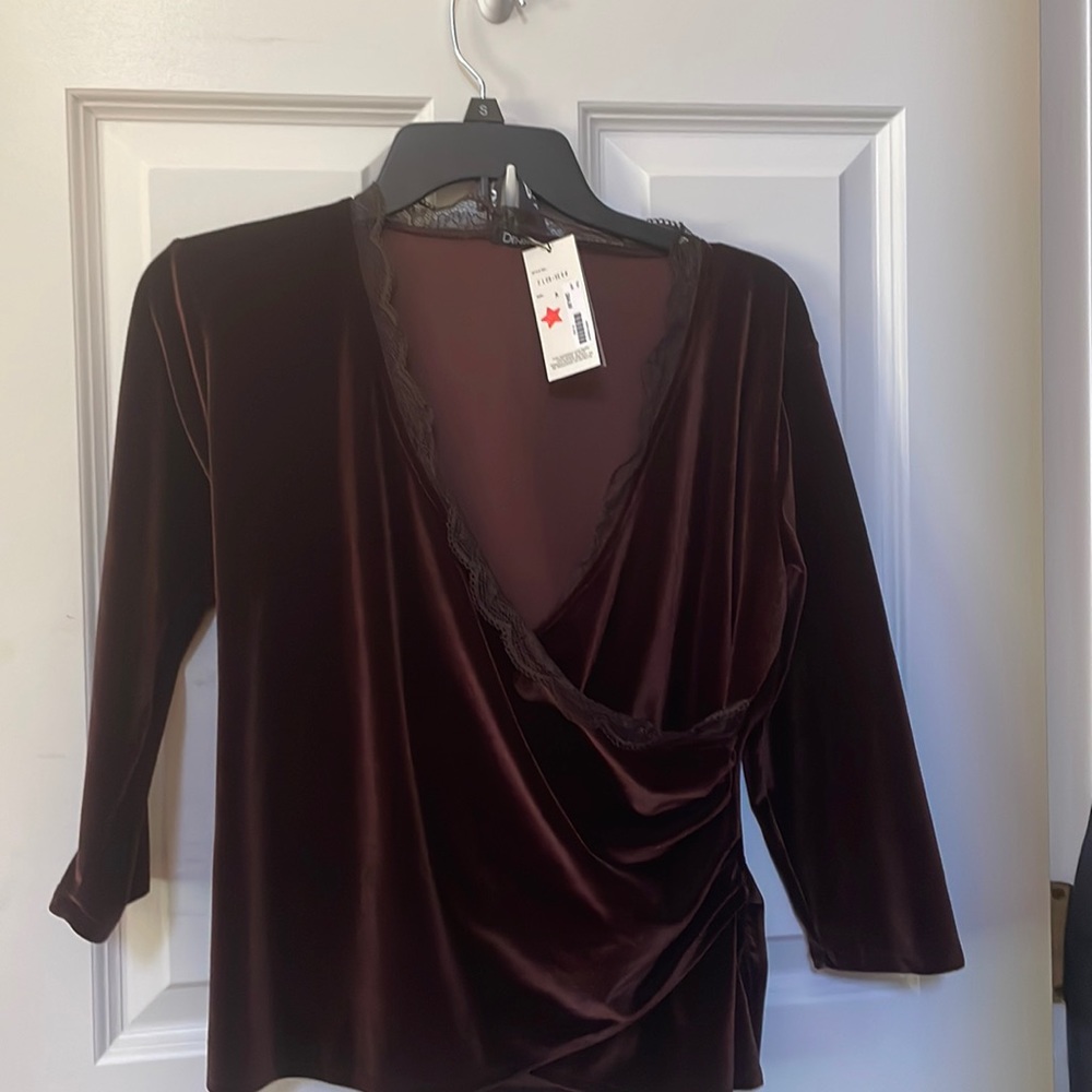 New with tags Velvet Crossover top  color is a dark purple or maroon color.